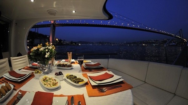 A dinner on a Elite yacht facing the First Bridge in the Bosphorus